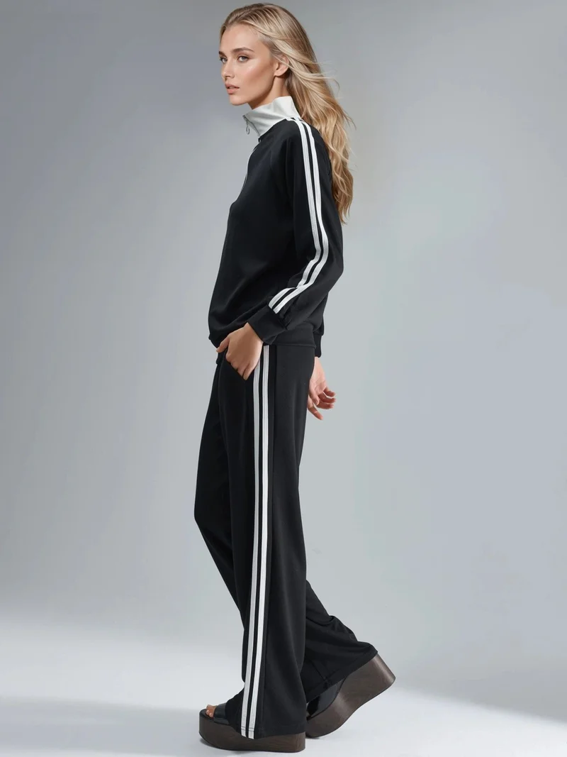 هيكاب طقم نسائي مودال واسع مخطط بياقة بسحاب من مجموعة بيرسان